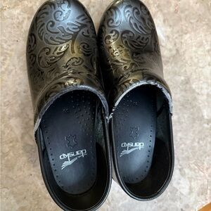 Dansko Black Embossed Leather Clogs with Scroll Detail